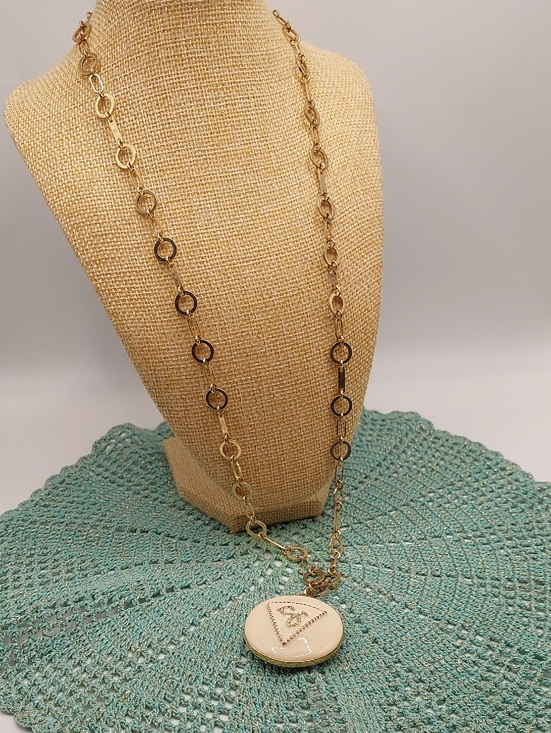 Guess Jewelry - GUESS Blingy AB Gold-Tone Long Pendant Necklace with Cream Enamel Locket